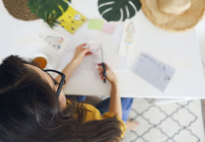 High angle view portrait of girl at home