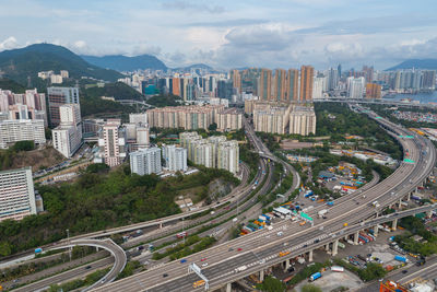 High angle view of city street against sky