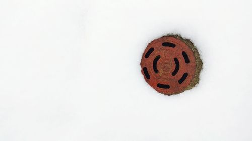 High angle view of smiley face on white background