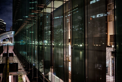 Illuminated buildings in city at night