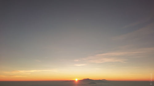 Scenic view of silhouette landscape against sky during sunset