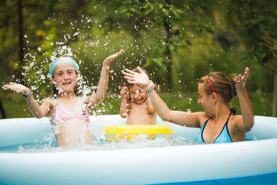 People enjoying in swimming pool