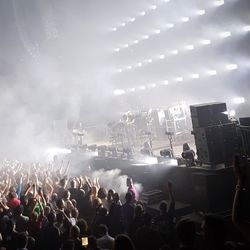 Crowd at music concert at night