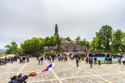 Group of people in front of building