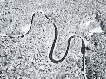 Close-up of metal chain on shore