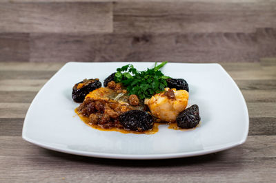 Close-up of food in plate on table