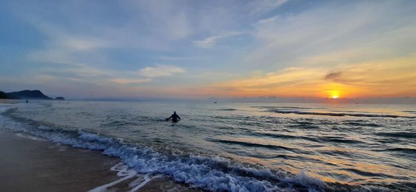 Scenic view of sea against sky during sunset