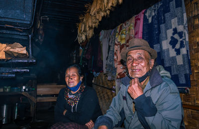 Senior couple sitting at home