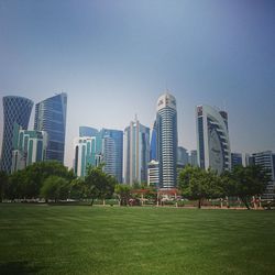 View of modern buildings against clear sky