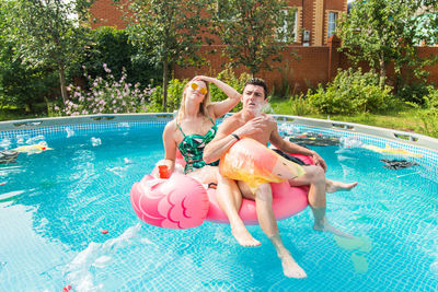 Full length of woman in swimming pool