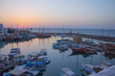 Boats moored at harbor