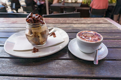 High angle view of dessert and coffee on table