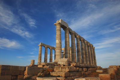 Low angle view of old ruins against sky