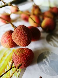 Close-up of lychees on table