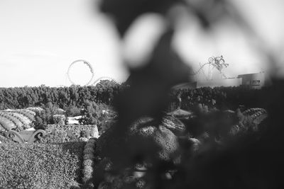 Blurred motion of man on field against sky