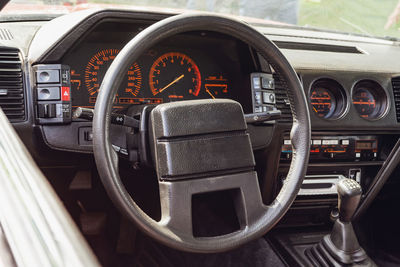 Interior view of old vintage car. view on dashboard of classic car.