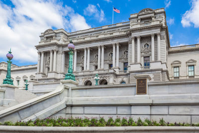 Low angle view of historical building against cloudy sky