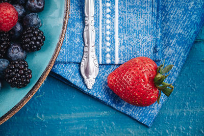 High angle view of strawberries on table