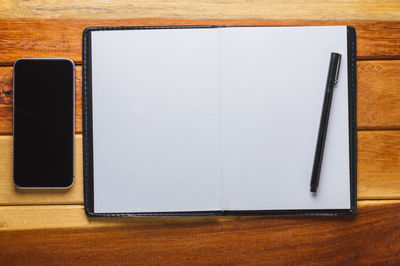 Directly above shot of open book on table