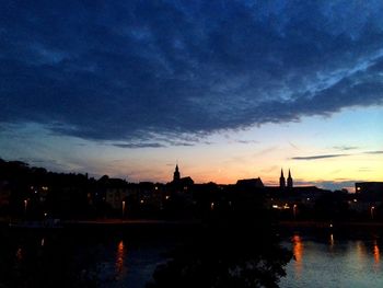 Cityscape with waterfront at dusk