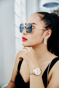 Portrait of woman wearing sunglasses