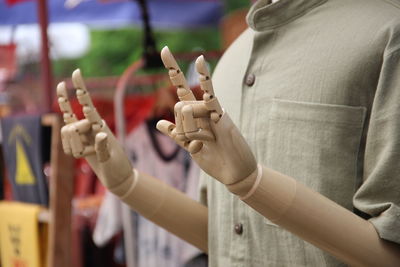 Close-up of woman holding hands