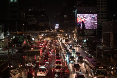 High angle view of traffic on city street at night