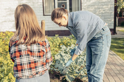 Side view of man working in workshop