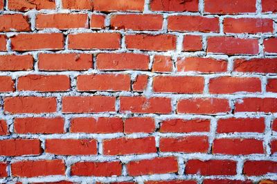 Full frame shot of red brick wall