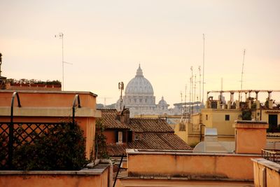 Buildings in city against sky