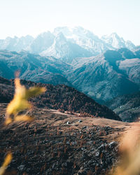 Aerial view of snowcapped mountains against sky