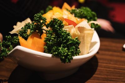 Close-up of salad in bowl on table