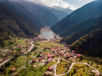 High angle view of trees and mountains against sky