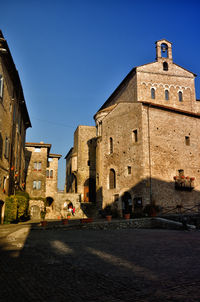 View of old building against blue sky