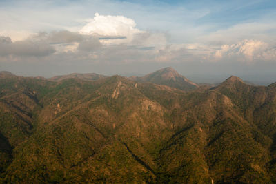 Mountains and hills covered with forest during sunset. philippines.