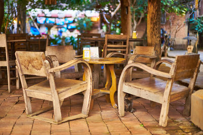 Chairs and tables at sidewalk cafe