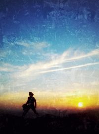 Woman looking at sunset