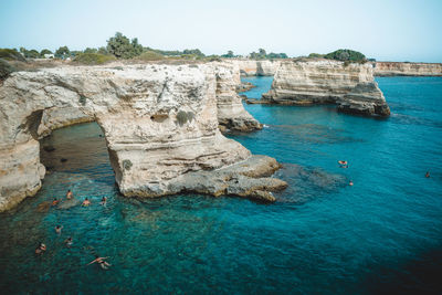 A great view on faraglioni di sant'andrea in puglia