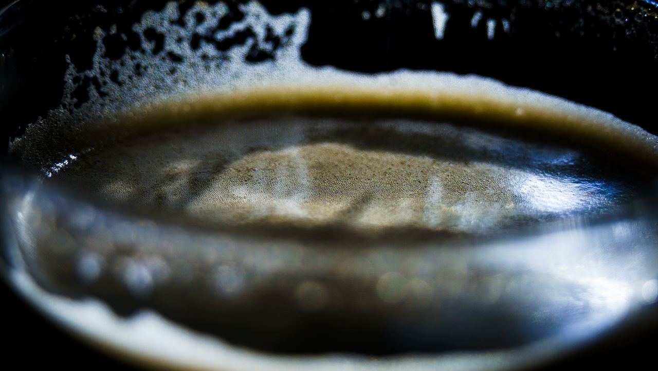 CLOSE-UP OF COFFEE CUP ON TABLE