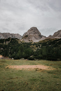 Scenic view of landscape and mountains against sky