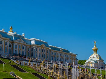 Panoramic view of historic building against blue sky