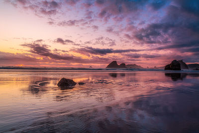 Scenic view of sea against sky during sunset