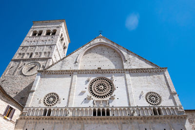 Low angle view of building against blue sky