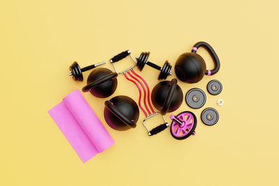 Directly above shot of objects on pink background