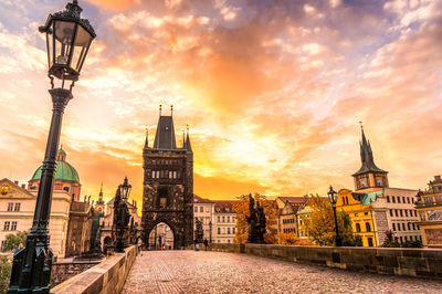 View of illuminated city at sunset