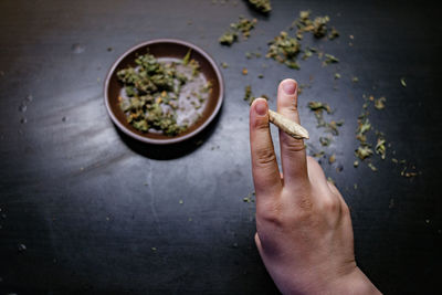 High angle view of man holding food