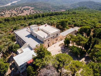 High angle view of townscape amidst trees and buildings