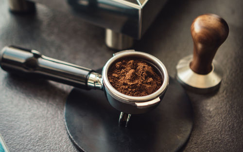 High angle view of coffee cup on table