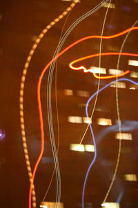Low angle view of illuminated ferris wheel