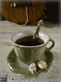 Close-up of coffee cup on table